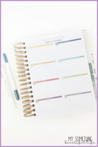 interior goal page of the MakseLife Planner and two pens