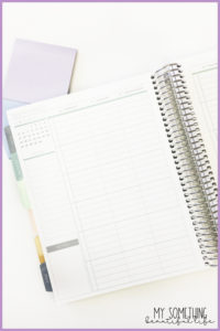 interior of plum paper planner and two sticky note pads